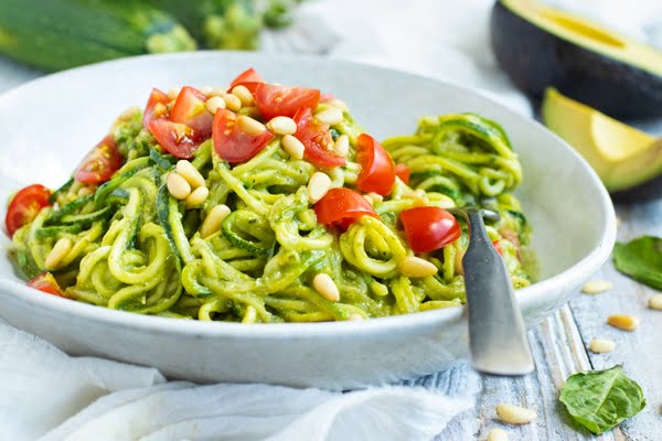 This is an image of the Zucchini Noodles with Pesto and Cherry Tomatoes meal.